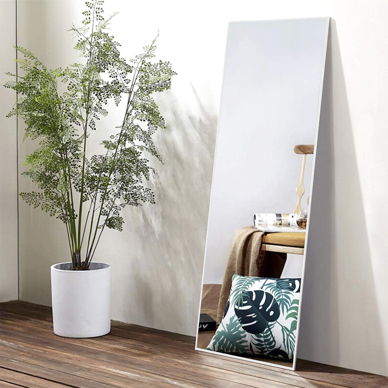 white full length leanning mirror