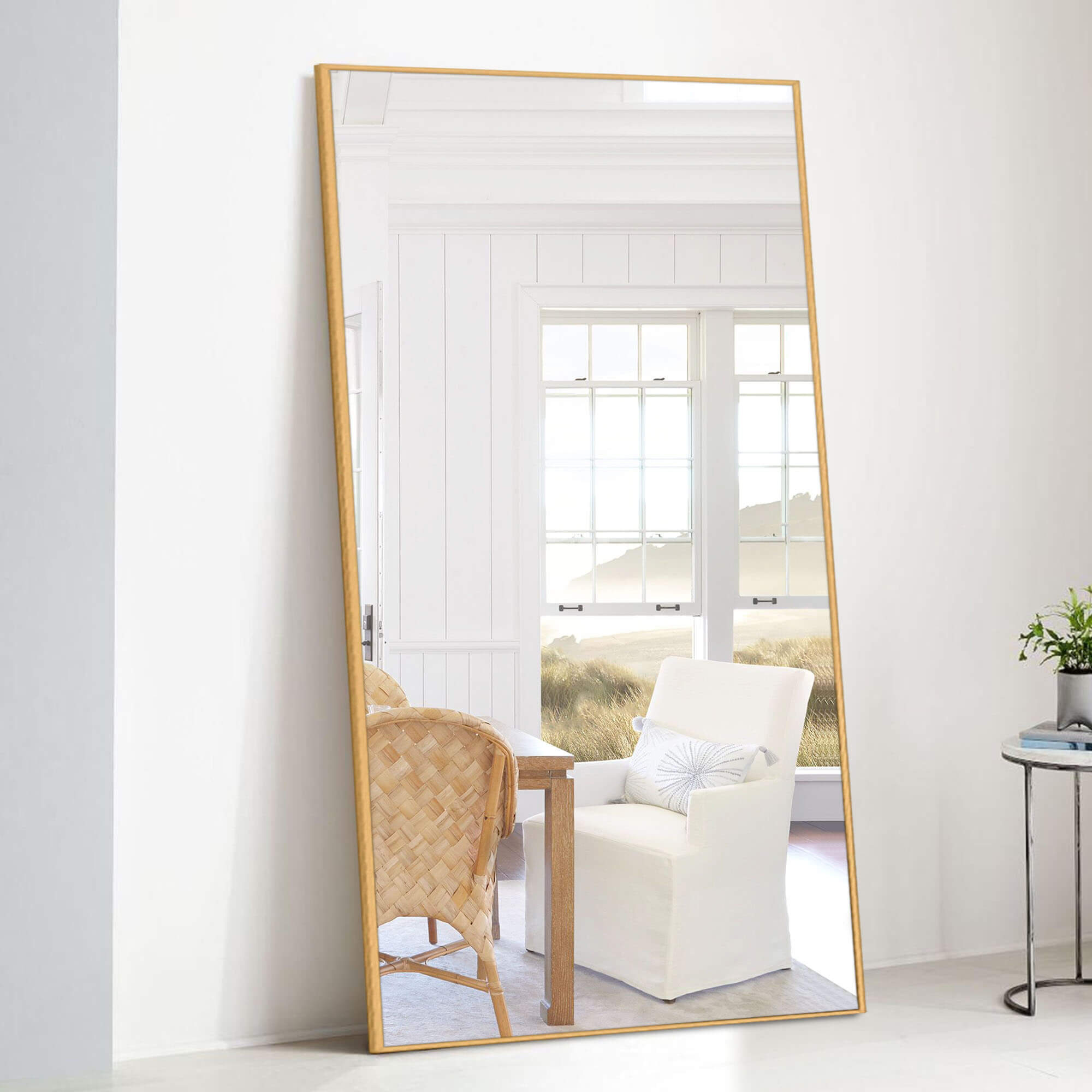 large gold full length leaning mirror