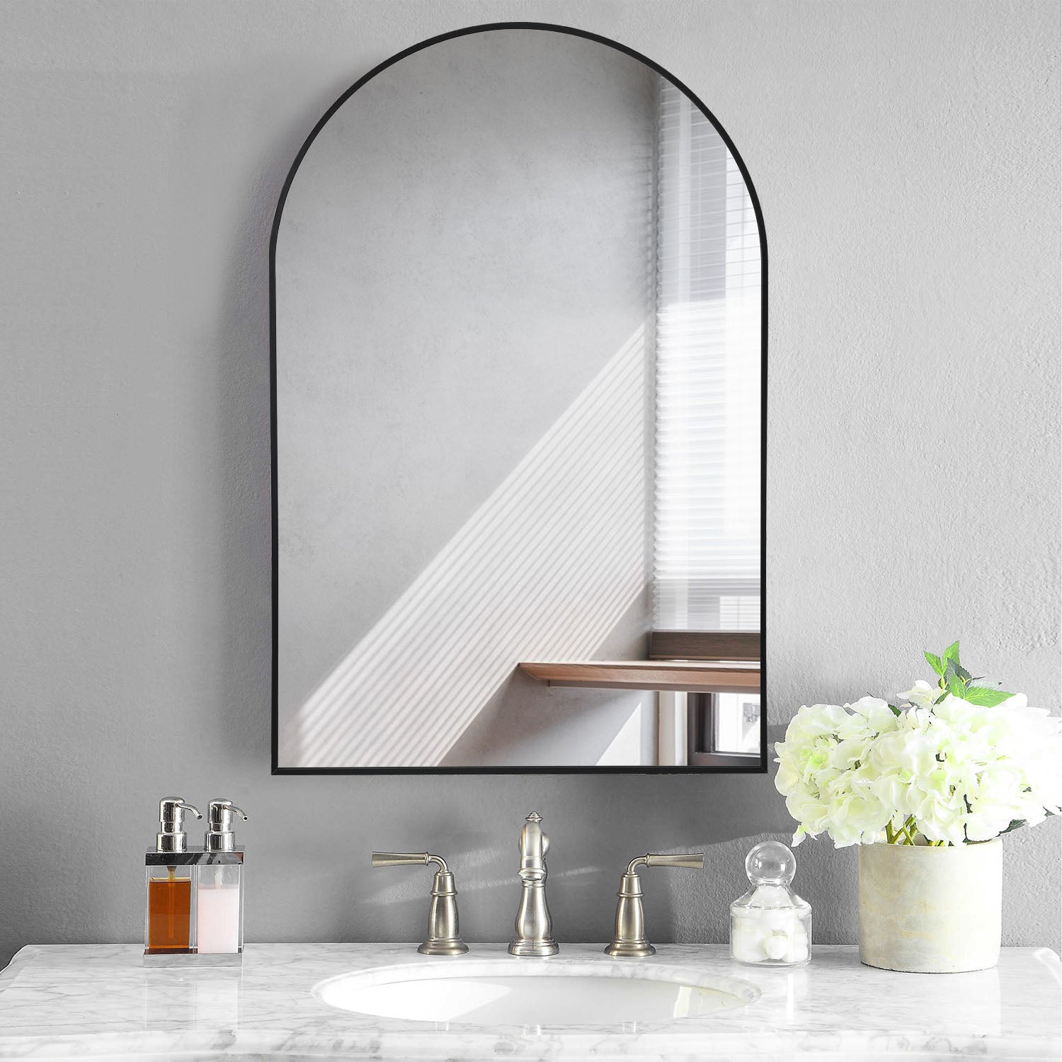 Black arched wall mirror