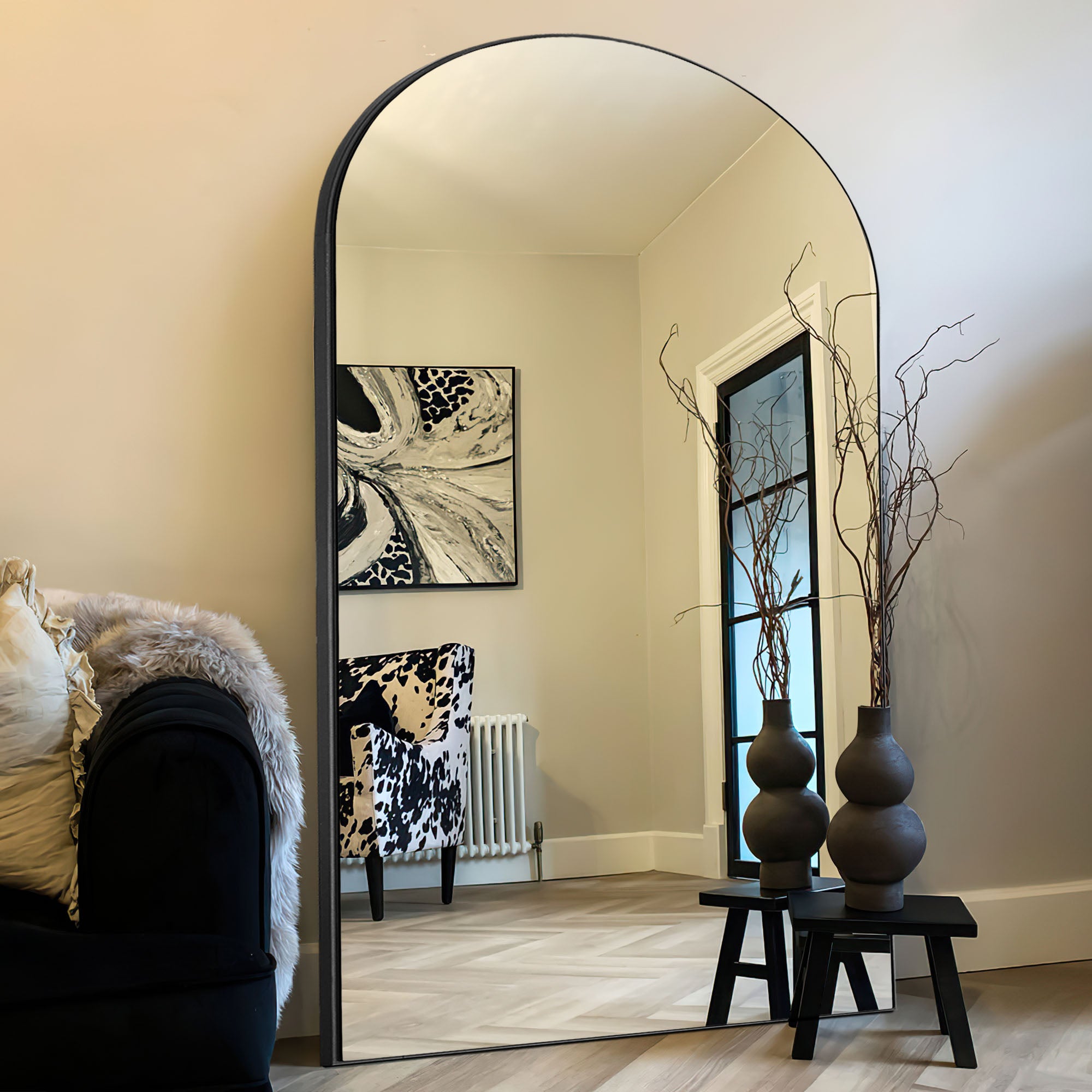 black wood frame arch mirror